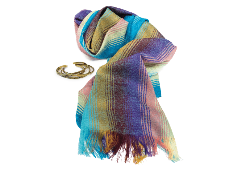 A multi-coloured scarf with 4 golden-coloured cuff bracelets.